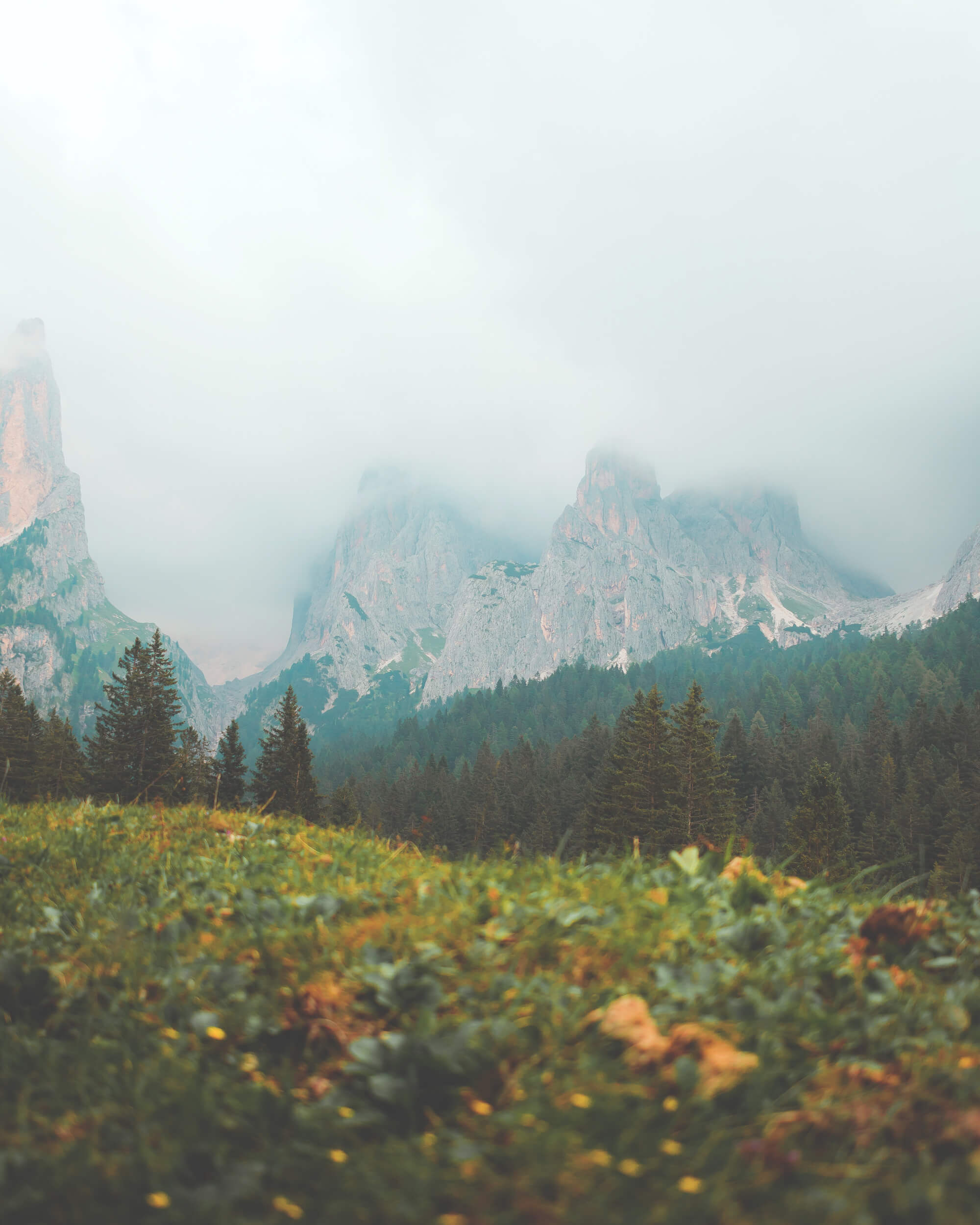 Spiky mountain covered in clouds